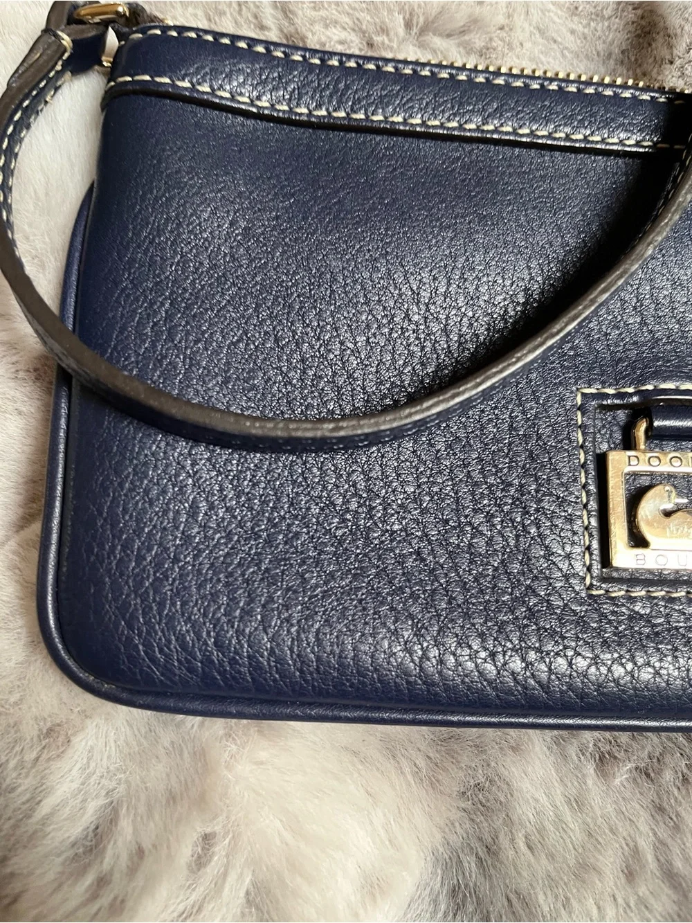 Dooney & Bourke Navy Pebbled Leather Wristlet with Fur Pom
